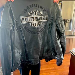 Woman’s Harley Davidson leather coat.